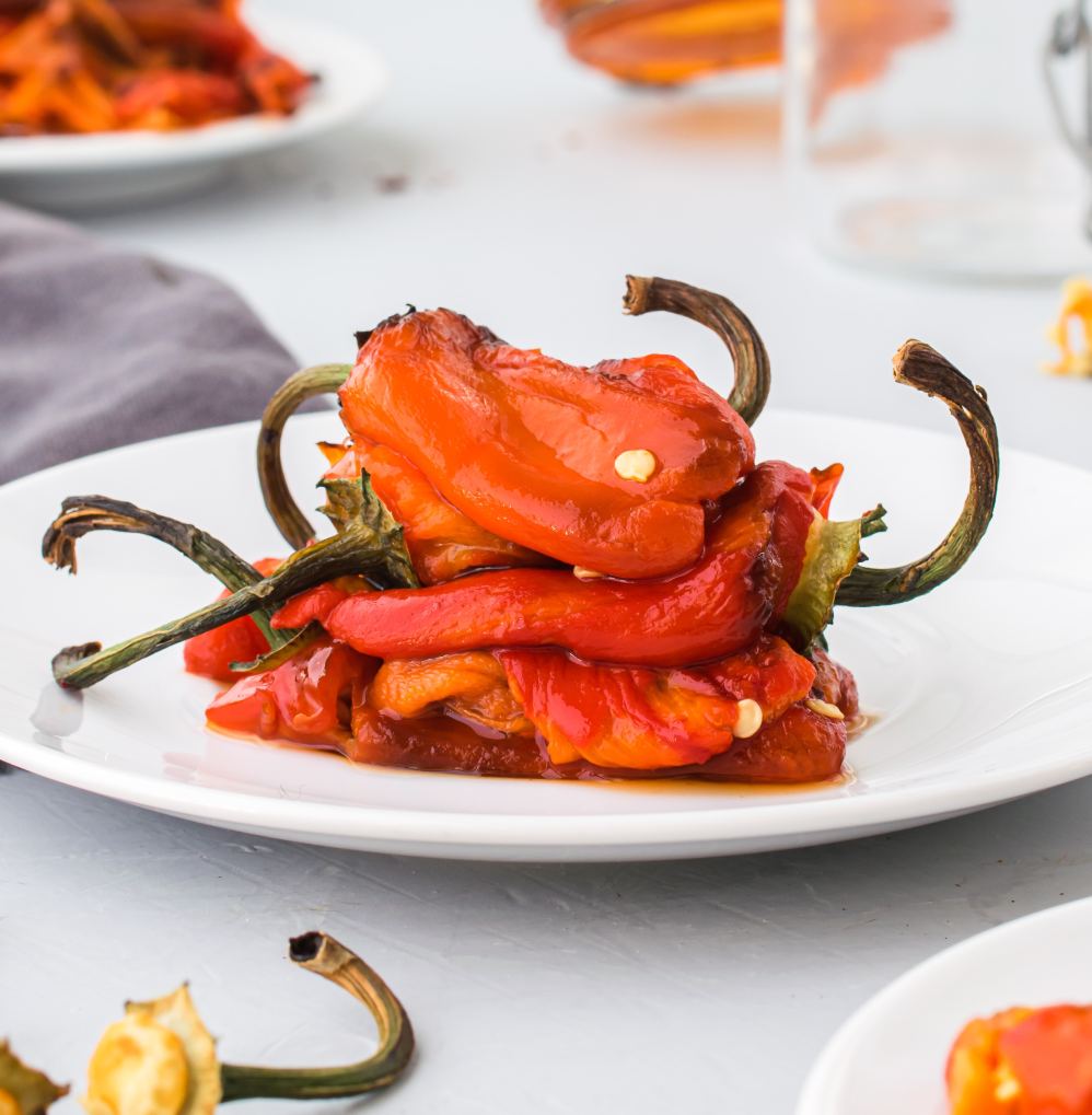 roasted peppers stacked on a plate